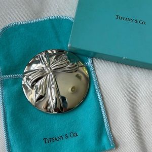 Tiffany’s hand/purse sterling silver mirror. Never used, in original pouch + box